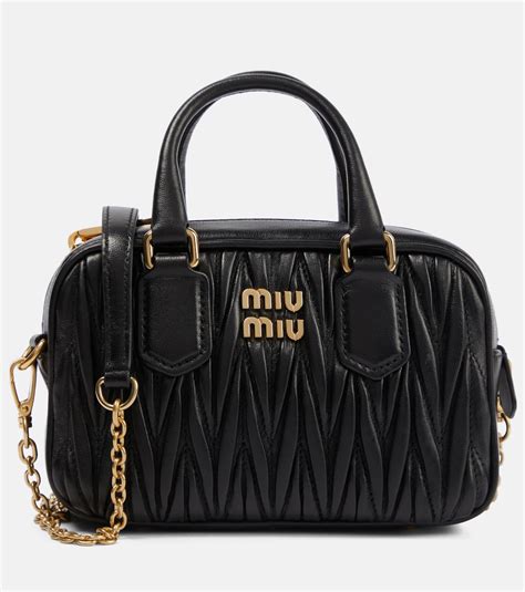 Matelassé leather crossbody bag Miu Miu Black in Leather